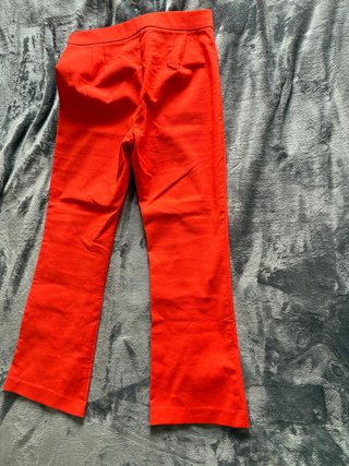 Pantalón Zara naranja acampanado