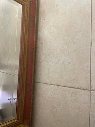 Espejo grande dorado con marco de madera