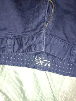 Pantalones cortos niño beige y azul Tallas en foto