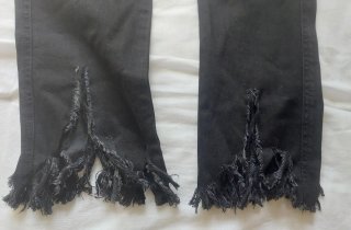 Pantalón cropped negro con flecos