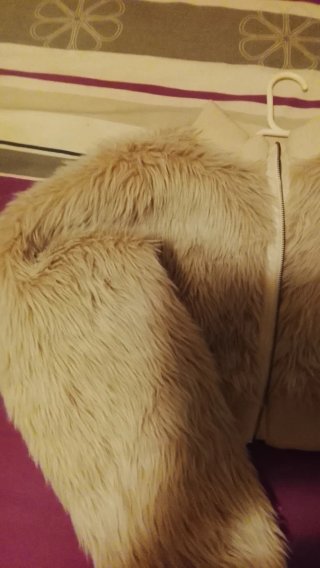 Chaqueta torera pelo beige