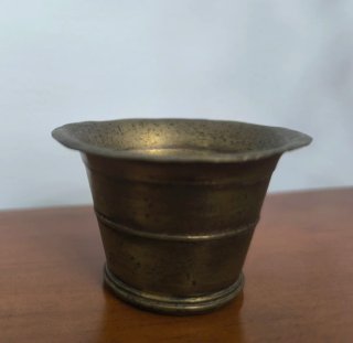 Lote de 7 morteros y mano de bronce