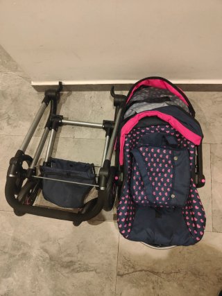 Carro de muñecas con bolso