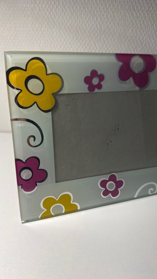 Marco de cristal con flores
