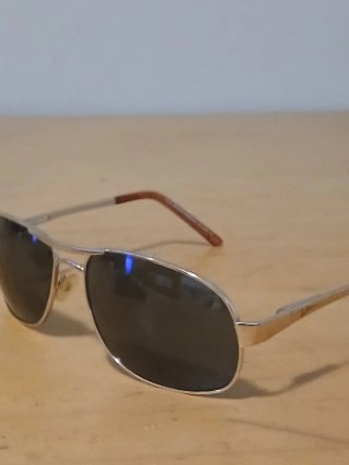 Gafas de sol Ray-Ban doradas y verdes