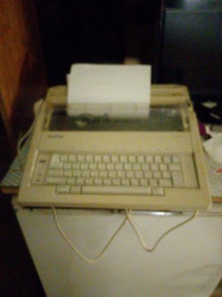 Máquina de escribir Brother AX210