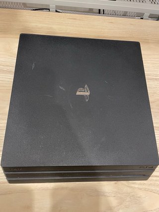 Ps4 Pro 1TB + Cargador Inalambrico + Mando Rojo