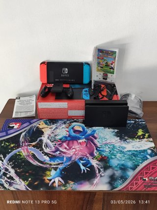 Nintendo Switch Lite + Mario Rabbids + Tappetino