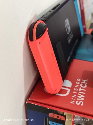 Nintendo Switch Lite + Mario Rabbids + Tappetino