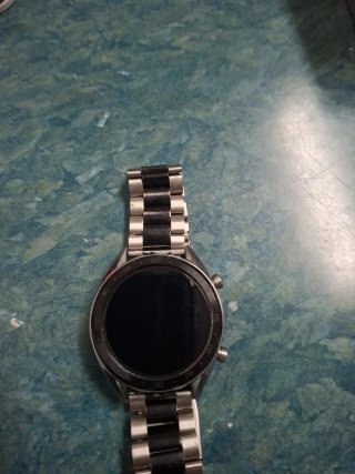 Reloj multifunción plateado y negro