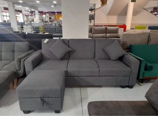 Sofá cama gris con arcón