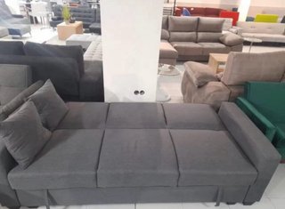 Sofá cama gris con arcón