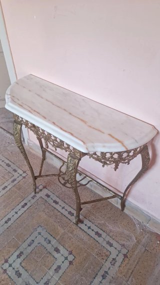 Consola antigua de bronce y mármol dorada