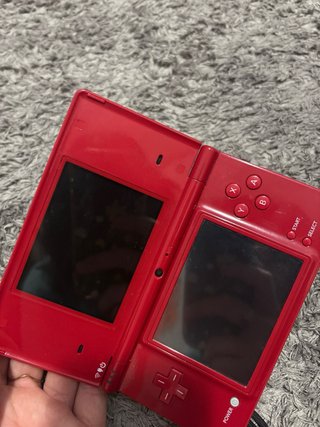 Nintendo DSi Roja con Caja y Juegos