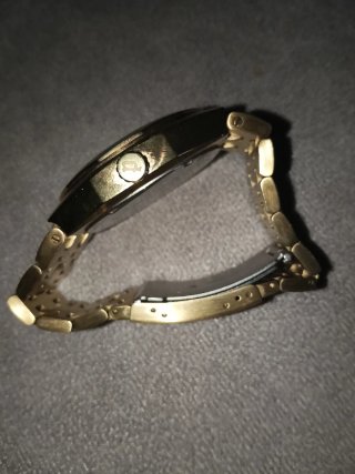 Reloj Police Dorado y Negro