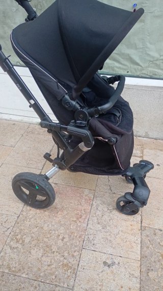 Silla de paseo negra en buen estado