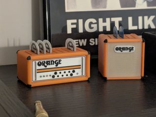 Organizzatore per plettri per chitarra con design di amplificatore
