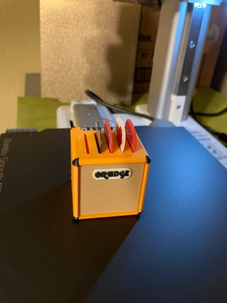 Organizzatore per plettri per chitarra con design di amplificatore
