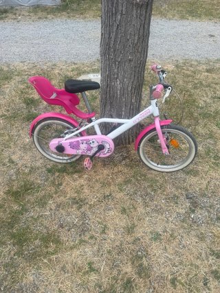 Bicicleta Btwin niña rosa con asiento