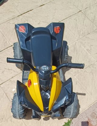 Quad eléctrico infantil amarillo y negro