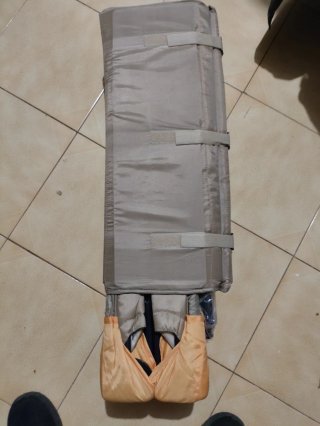 Cuna de viaje portátil.