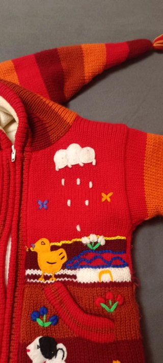 Chaqueta infantil tejida con capucha