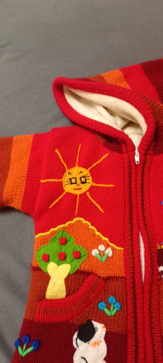 Chaqueta infantil tejida con capucha