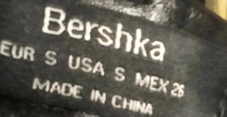 Falda mini Bershka efecto piel