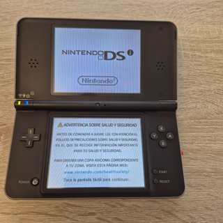 Nintendo DSi XL Negra + Funda Minnie Mouse