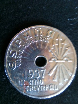 Moneda 25 cts con agujero