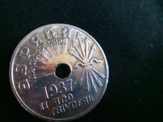 Moneda 25 cts con agujero