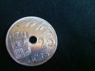 Moneda 25 cts con agujero