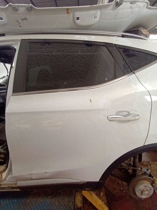 PUERTA TRASERA IZQUIERDA MG ZS (08.2022->)