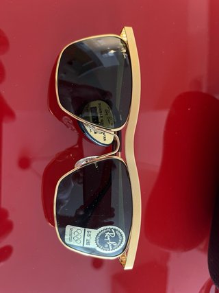 Ray-Ban Doradas y Negras Olimpia de Luxe III.