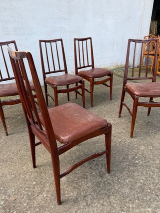 Juego de 6 sillas de madera y cuero