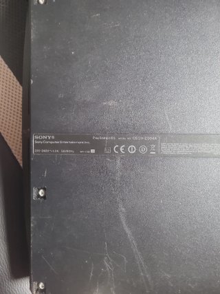 Consola PS3 Slim Argento con dettagli rossi