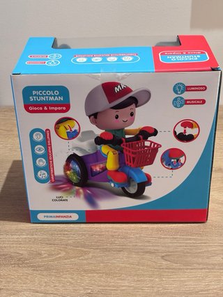 Giocattolo Bambola Bimbo Moto Luci Suoni