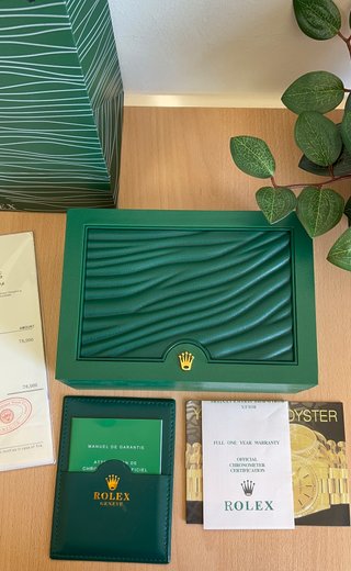 Caja y documentación Rolex