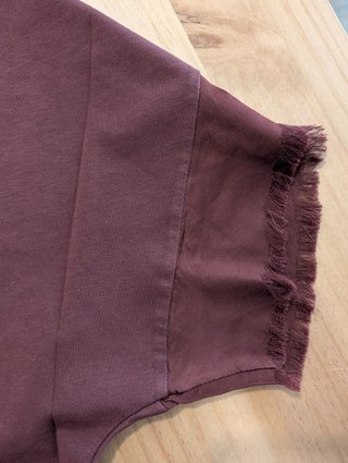Blusa Tentazioni granate con etiqueta