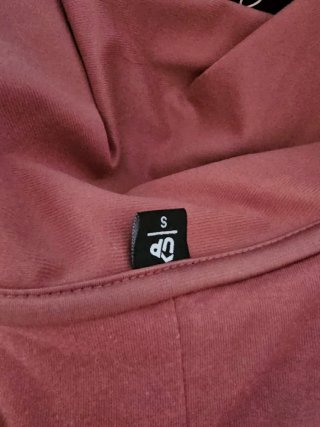 Conjunto deportivo rosa y blanco