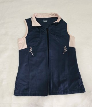 Chaleco deportivo azul y beige