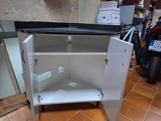 Mueble rinconera con tapa de mármol negro