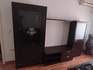 Mueble salón color vengue con almacenaje