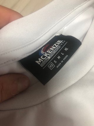 Camisetas McKenzie Negra y Blanca Tallas S y XS