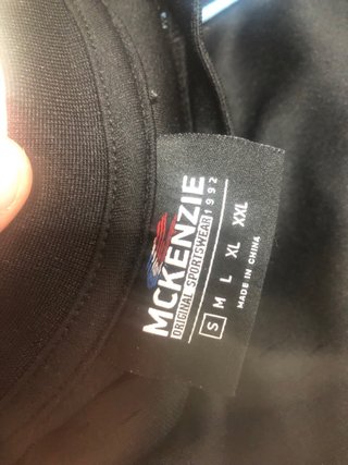 Camisetas McKenzie Negra y Blanca Tallas S y XS