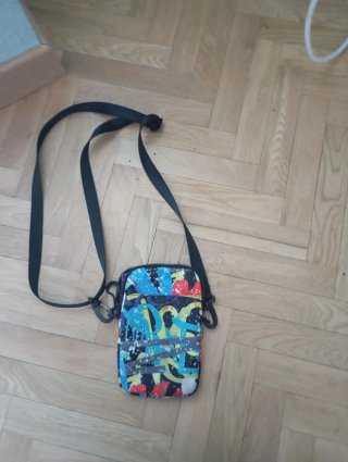 Riñonera multicolor no me acuerdo de la marca