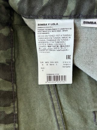 Pantalón estampado verde y negro
