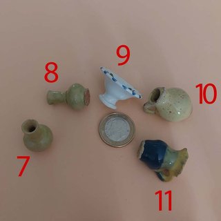 Miniature in ceramica per presepe e case delle bambole da leggere