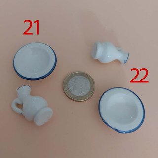 Miniature in ceramica per presepe e case delle bambole da leggere