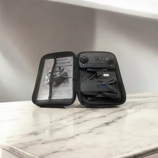 Dron plegable negro con mando
